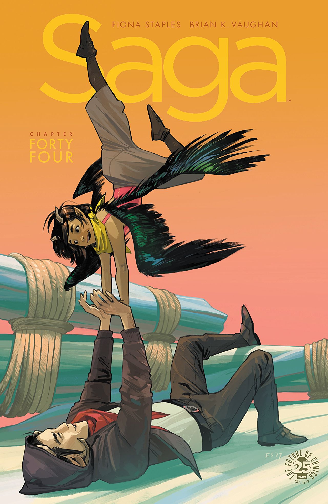A bird winged young girl poses acrobatically in the arms of an older man who is pushing her up from the ground. This is the cover for Saga. 