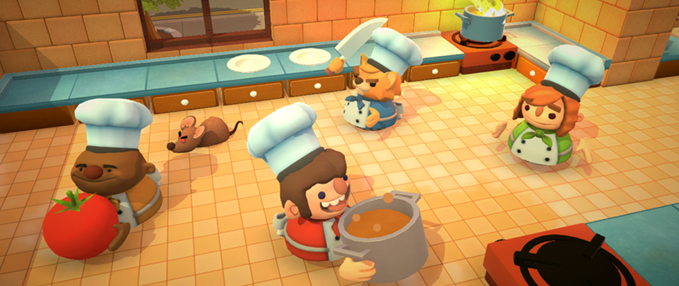 A few cartoon chefs running around haphazardly in an orange tile kitchen. This is a still from overcooked.