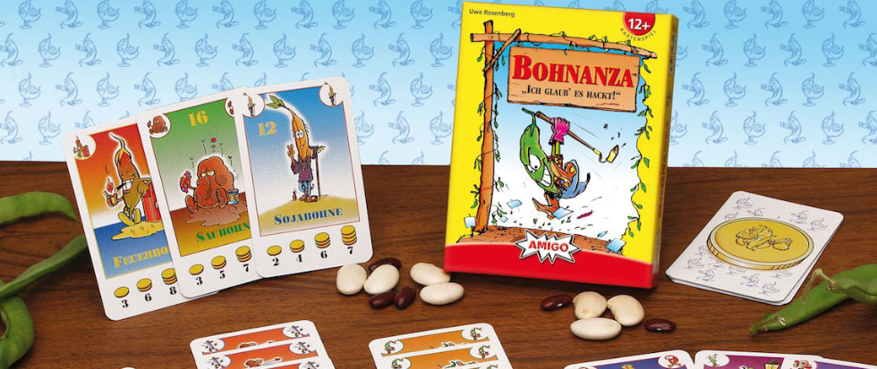 A tabletop with a display of the bean counting game Bohnanza.