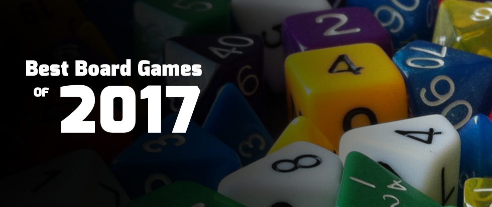 A pile of assorted tabletop dice with text over that reads "best board games of 2017"