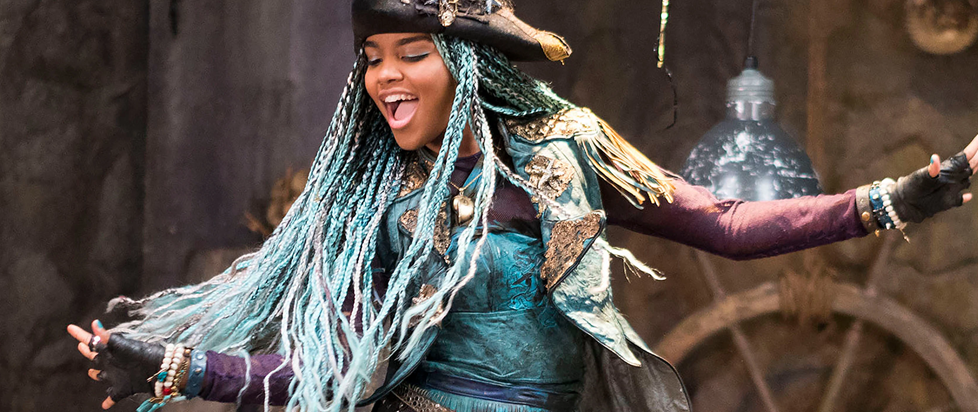 a jubilant singing african american woman with long blue braids and a tricorner hat