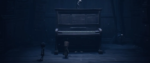 A piano with two small children looking at it. This is a still from Little Nightmares II.