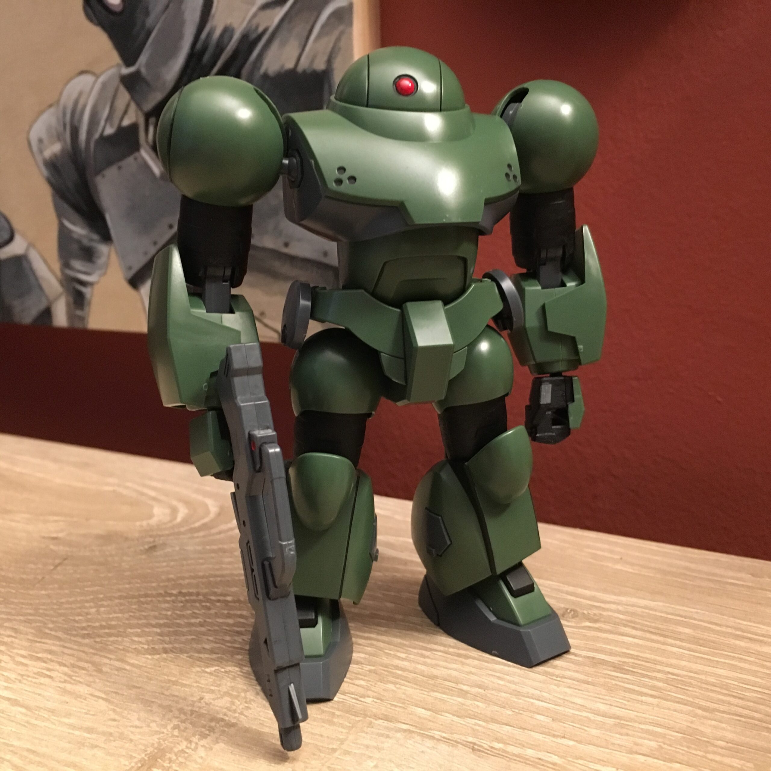 A dark green mobile suit model from Mobile Suit Gundam.