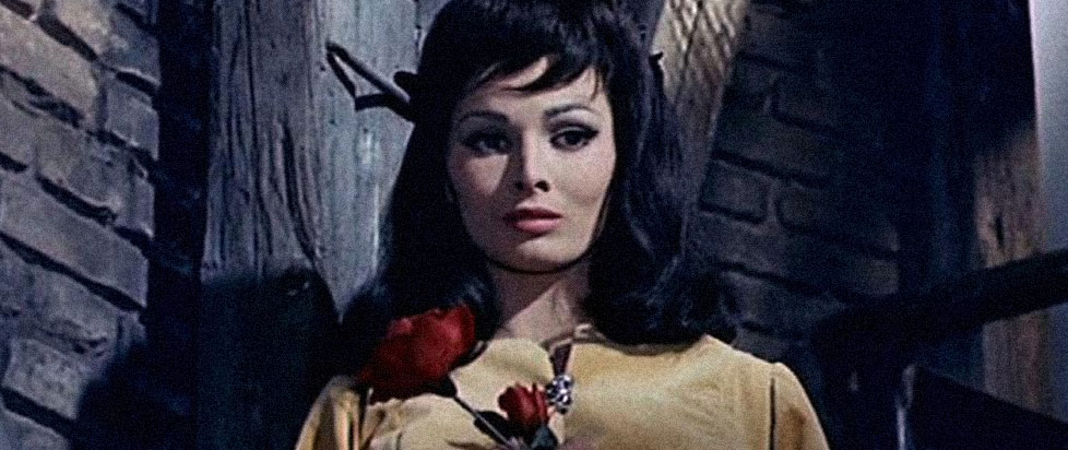 A woman in a yellow dress holding a red rose.