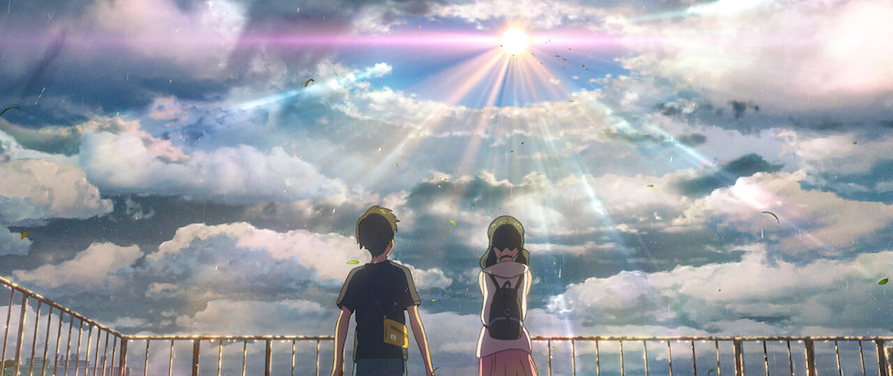 A young man and woman stand at a rusty railing, looking towards a distant sun breaking through stormy clouds.