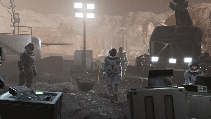 Four astronauts in space suits work with giant machines on what looks like a rocky planetary outpost.