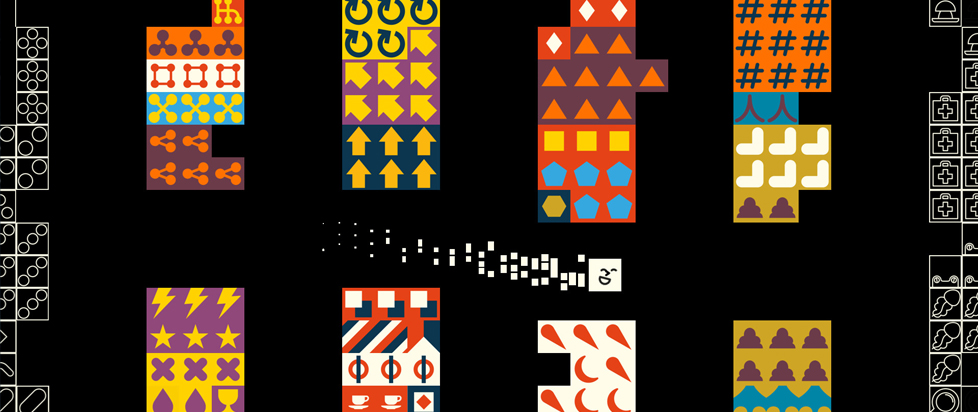 Tiny multicolored squares are arranged in larger blocks on a black background. Their orientation suggests a top-down view of a warehouse setup.