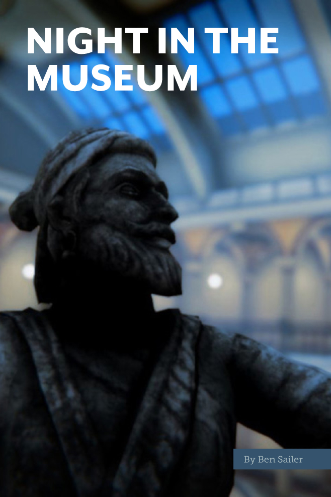 A close-up shot of a statue of a bearded man set in a large museum atrium.