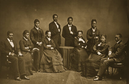 A sepia-toned photograph of the Fisk Jubilee Singers, an African-American a capella group from Fisk University.