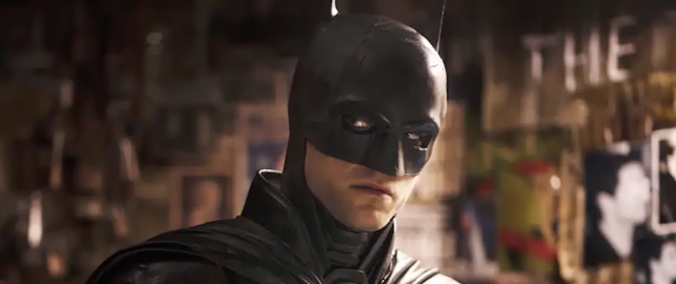 A close-up of Robert Pattinson wearing cape and cowl in The Batman.