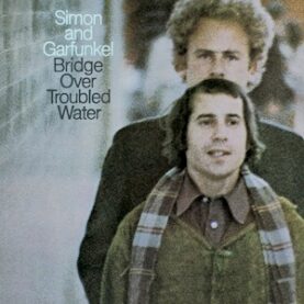 The cover of the Simon and Garfunkel album Bridge Over Troubled Water featuring a photograph of the two musicians in the 1970s.