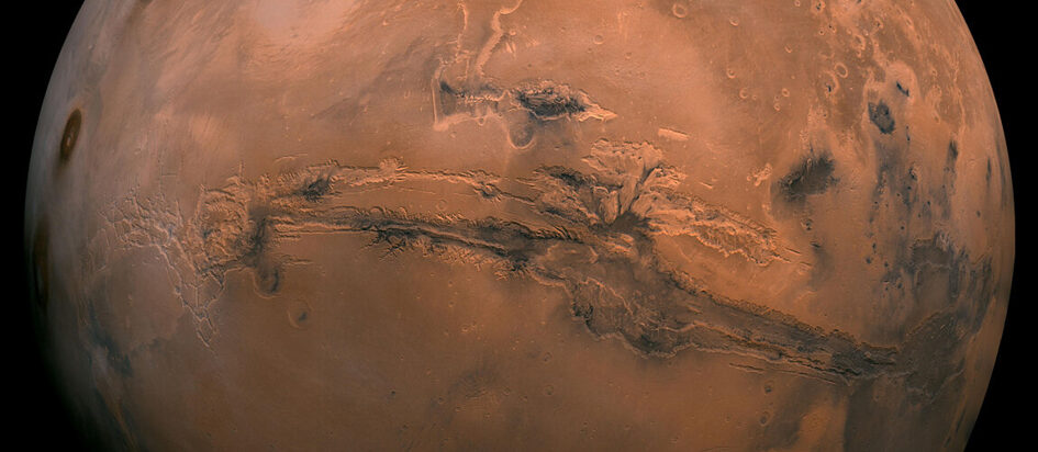 A hi-res telescopic image of the red planet Mars.