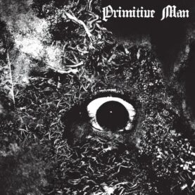 The cover of Primitive Man's Immersion album: a close-up photograph of a calf's eye opened wide in what seems like fear. The photo is rendered in such high definition that the individual strands of the calf's hide make it look almost diseased.