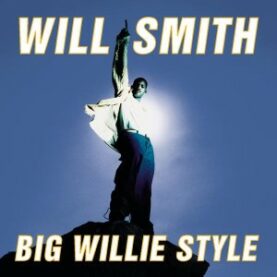 The cover of Will Smith's Big Willie Style album, showing Smith in dark jeans and a white button-down raising a fist in the air.