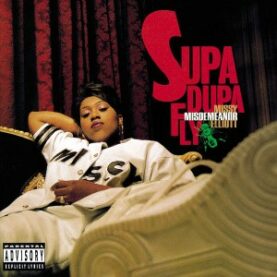 The cover of Missy Elliott's Supa Dupa Fly album showing Elliott leaning back on a couch with red damask curtains hung behind her. The bottom of her sneaker features prominently.