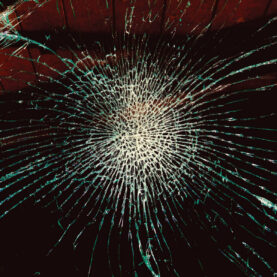 The Blind Girls' The Weight of Everything album cover art, featuring a spiderweb of cracked glass.