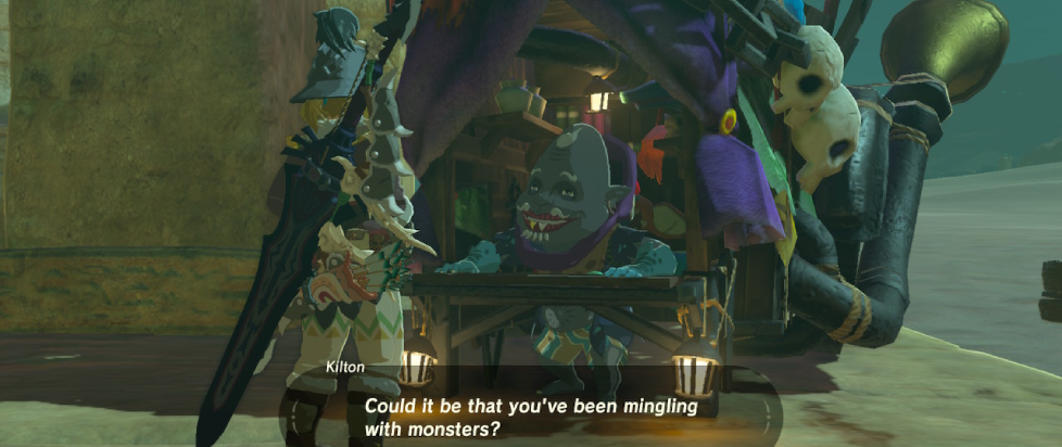 Link, with a mishmash of monster weapons and armor pieces, speaks with Kilton, who's wearing his monster lipstick and makeup while managing the front counter of his balloon monster parts business