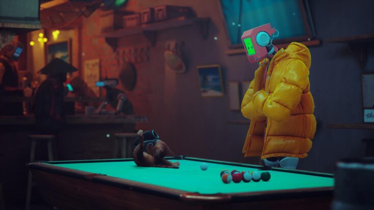 The cat from Stray grooms itself on the pool table of a dimly lit bar as a robotic patron in a stylish yellow puffer jacket looks on. 