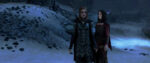 A screencap from Skyrim shows Serana and the player character having a nighttime walk along a snowy path.