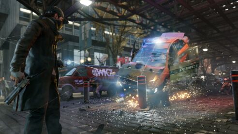 Another screenshot from Watch Dogs with main character Aiden in his ball cap and mask holding a gun in one hand and a phone in the other and there are many lines connecting the phone to a crashing police car while newscasters cower nearby