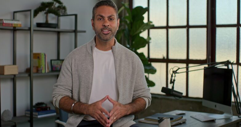 Financial expert Ramit Sethi seriously addresses the camera in a clip from How to Get Rich.