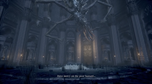 A screenshot from Bloodborne: a circular room ringed with religious statues around a dead fountain with a single door, above which clings an enormous dark god with eight arms and a tentacled mouth