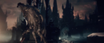 A screenshot from the trailer for Bloodborne, with a hulking humanoid in a fedora stalking through bare streets with peaked buildings
