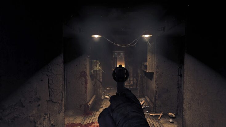 The player stares down the barrel of their revolver in a screenshot from Amnesia: The Bunker.