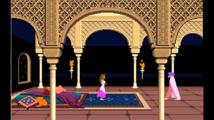 A screenshot from Prince of Persia shows a man in a cape approaching a woman standing near a pile of cushions inside an open-air section of a palace.