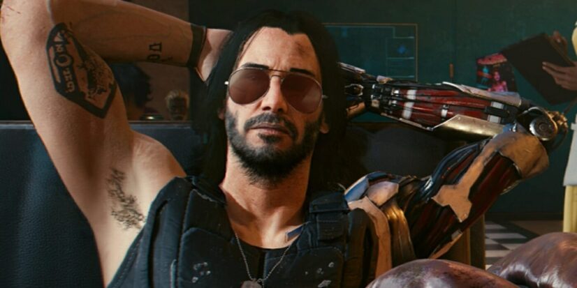 Johnny Silverhand from Cyberpunk 2077, played by actor Keanu Reeves. He wears a black tank top and aviator shades. The lower half of his left arm is cybernetic.