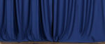 Heavy blue curtains, drawn across a stage.