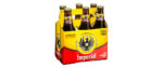 A sixer of Imperial Classic beer, the box sporting a splashy yellow and red color scheme with a black eagle as the logo.
