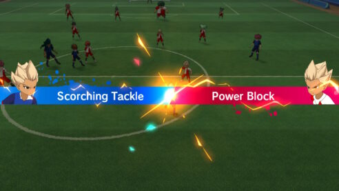 A screenshot from Victory Road showing a soccer field full of players while two players stare at each other and the names of their signature moves are displayed, Scorching Tackle and Power Block