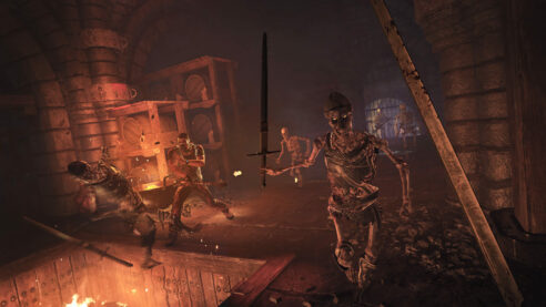 A screenshot from Dying Light in a castle cellar or dungeon with barrels and bricks and torchlight and skeletons in medieval soldier helmets and swords