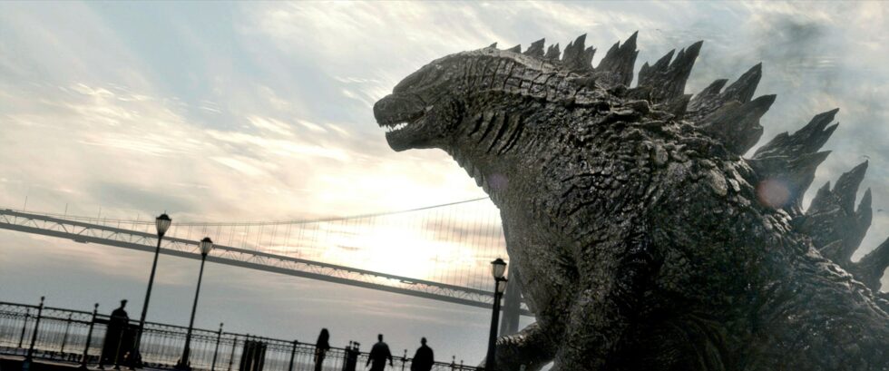 Godzilla looms over the observation deck below the Verrazano bridge at dusk.