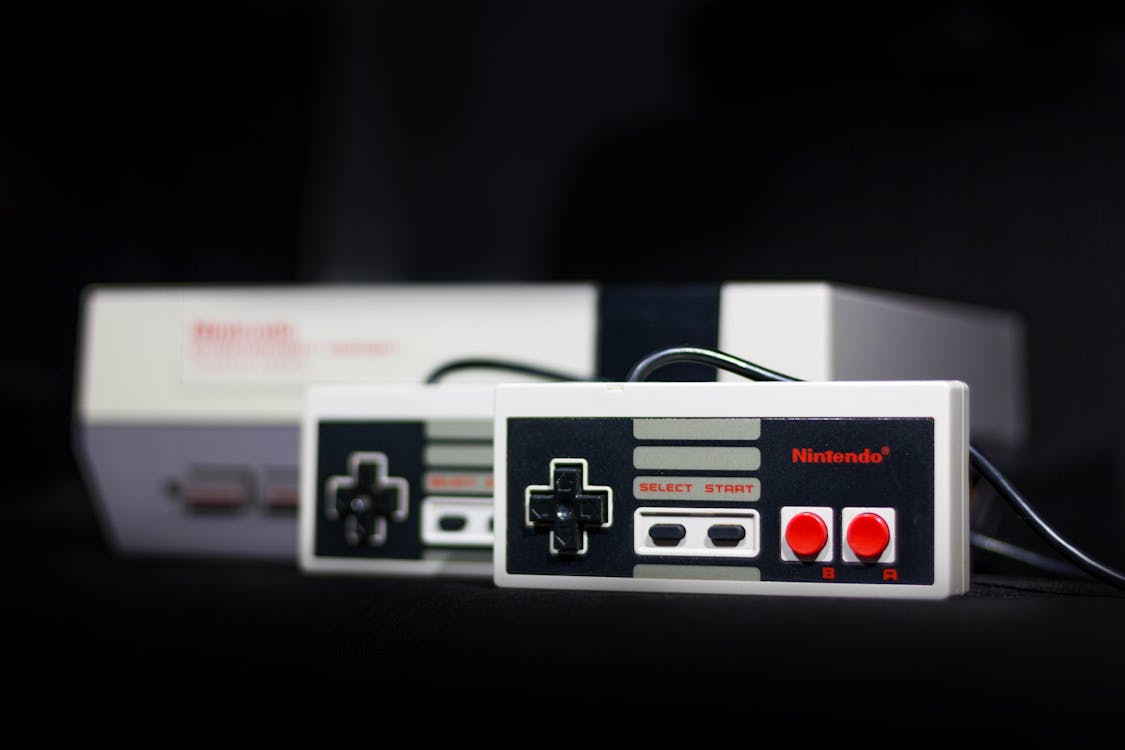 Free Gray Nintendo Nes Console And Controllers Stock Photo