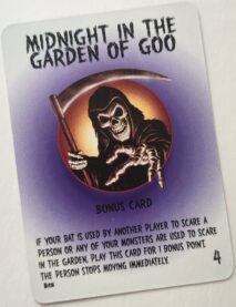 A card for Bump in the Night that says Midnight in the Garden of Goo with an image of a skeleton in a black robe holding a scythe