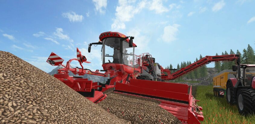 A harvester processes grain into a huge pile in a screenshot from Farming Simulator 17: Nintendo Switch Edition.