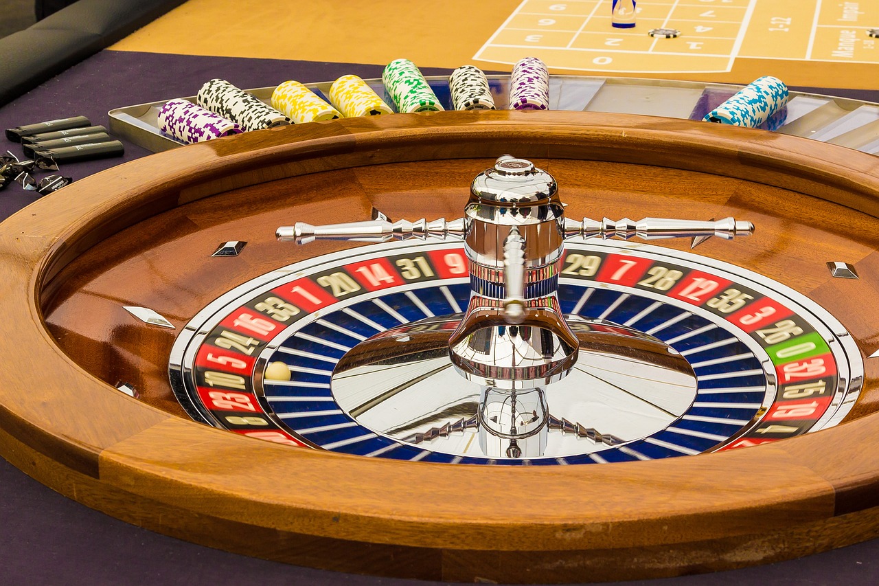 A roulette wheel with chips on it AI-generated content may be incorrect.