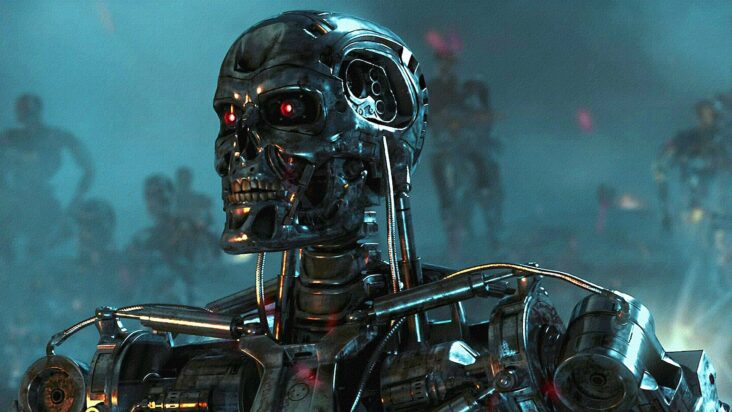 The shiny chrome skeleton of a terminator stares into the distance, its eyes a menacing red.