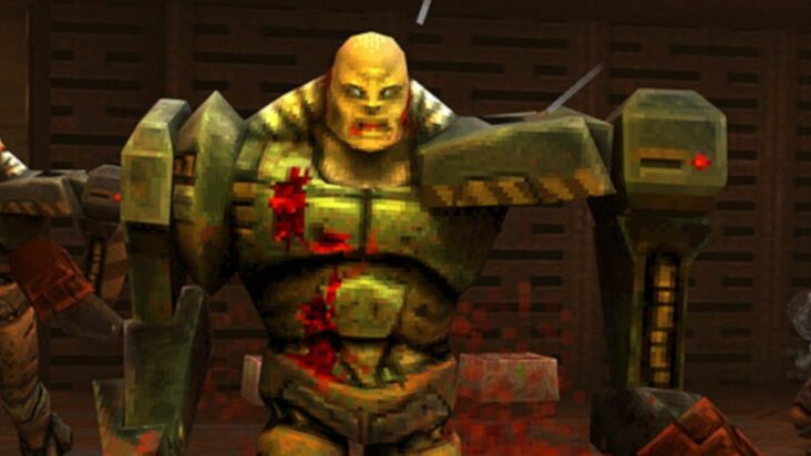 A bloodied Quake II enemy with hollow white eyes and a mechanized left arm stares soullessly forward.