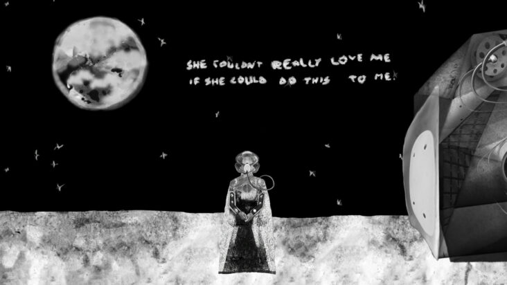 A screenshot of Stone's Ritual of the Moon shows a woman standing on the surface of the moon next to a capsule, Earth in the inky sky behind her. Words on the screen spell out, "she couldn't really love me if she could do this to me."