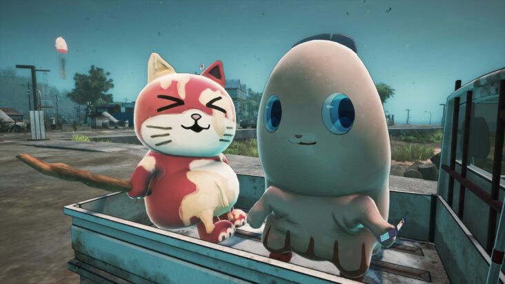 A cat and whale mascot sit smiling from the back of a small pickup truck in this screenshot from Promise Mascot Agency.