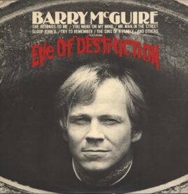 Album cover for Barry McGuire in black and white and his face front and center, his name at the top, other songs listed, but Eve of Destruction is in red above Barry's head 