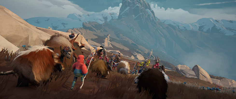 A screenshot from Herdling shows herders and herd traversing a mountain slope, even taller peaks rising tall in the distance.