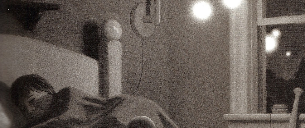 A greyscale drawing of a small boy asleep in a four-poster bed, moonlight shining through the window.