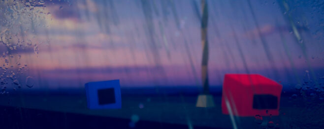 A screenshot from Zarvot where the red and blue squares are facing each other under a pink and blue sky and a rainy lens effect