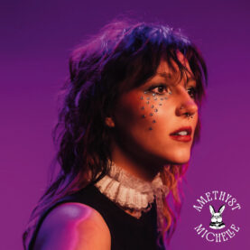 The cover for Amethyst Michelle's Through the Tears shows shows the singer in front of a deep purple background with several sparkling jewels affixed to her cheeks.