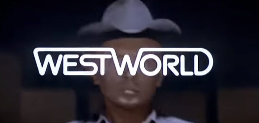 A screenshot from the trailer for Westworld where a terrifying Yul Brenner in a black cowboy hat is obscured by a nearly single line version of the film's title