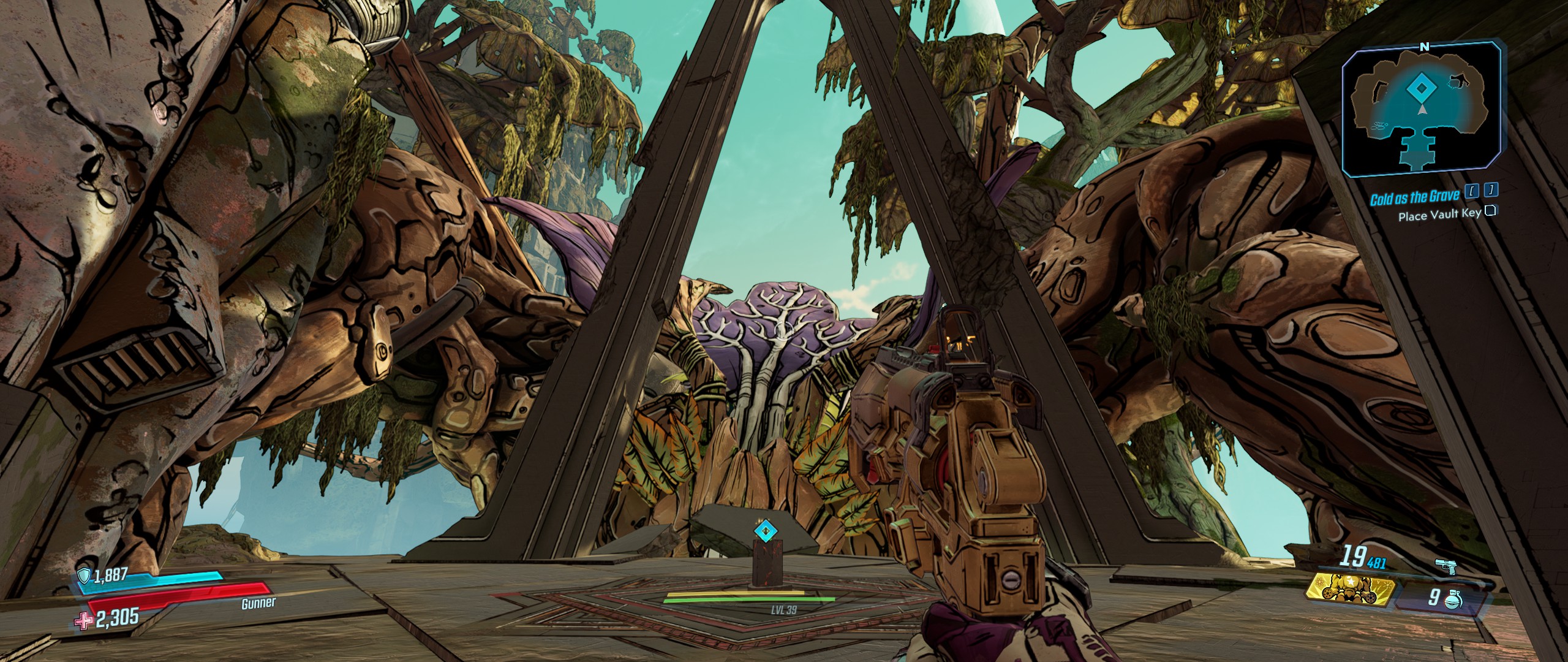 arena features a unique blend of organic, alien-looking structures and geometric metal architecture. Large, brown, gnarled forms dominate the sides, while a central organic-looking figure has a veiny purple center. 